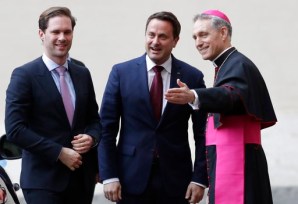 Luxembourg's Prime Minister Xavier Bettel is welcomed by Prefect of the Pontifical household Georg Gänswein as he arrives at the Vatican for a meeting with Pope Francis, Friday, March 24, 2017. Leaders of EU and heads of EU institutions were received by Pope Francis ahead of an EU anniversary summit. (AP Photo/Alessandra Tarantino)